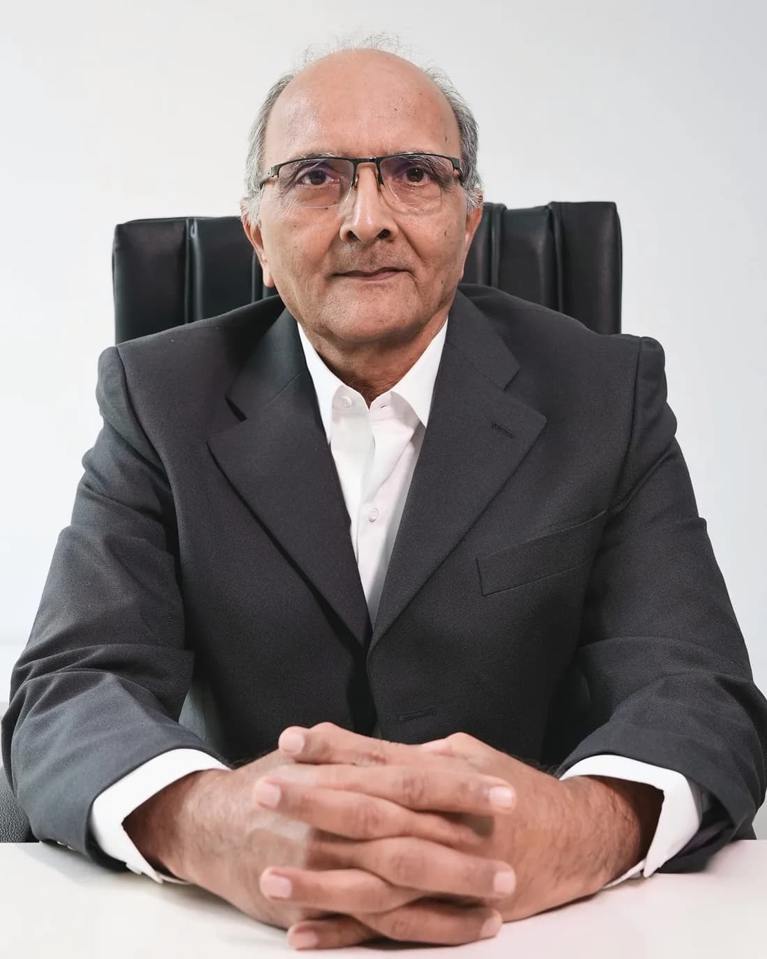 Mr. Sunil Kulkarni, Sr. Vice President (Finance & Accounts), seated at his desk